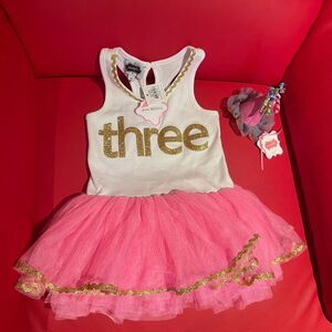 Tutu dress+ matching hair clip.